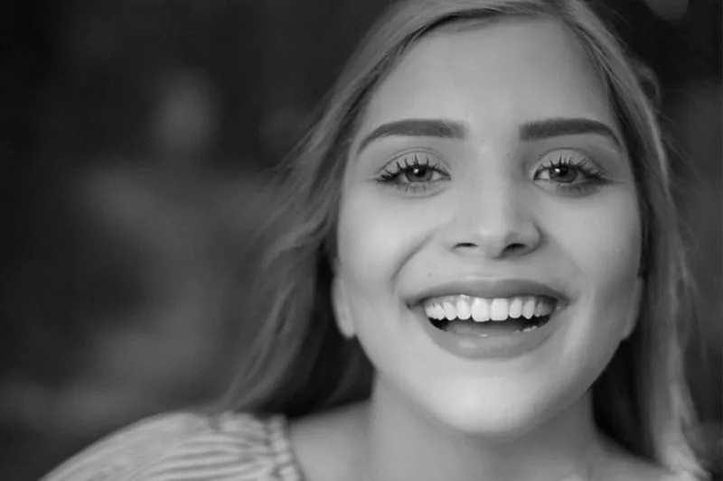 A patient smiling after treatment