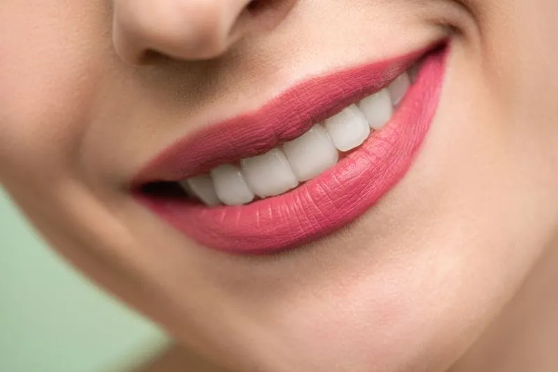 A patient smiling after treatment